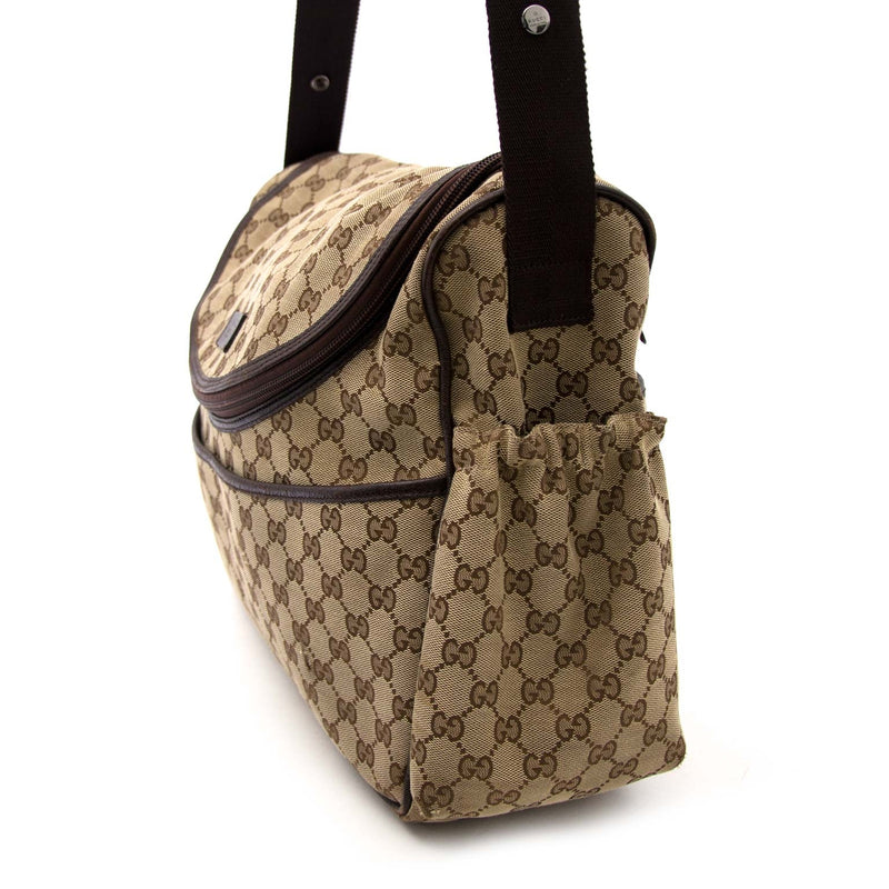 Gucci Monogram Diaper Bag Buy authentic designer Gucci secondhand bags at Labellov at the best price. Safe and secure shopping. Koop tweedehands authentieke Gucci tassen bij designer webwinkel labellov.