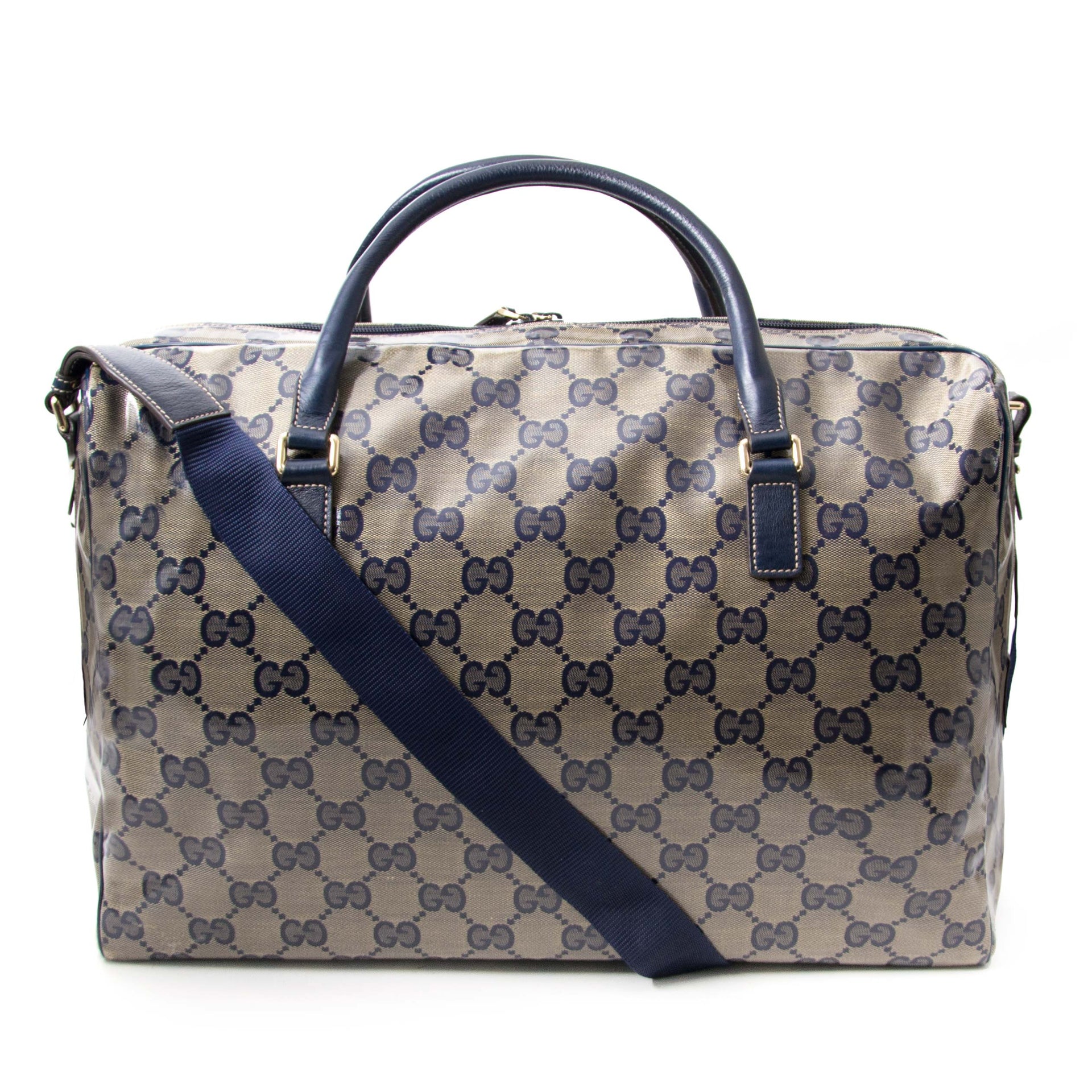 Buy and sell your authentic Gucci GG Supreme Coated Monogram Canvas Travel Bag for the best price