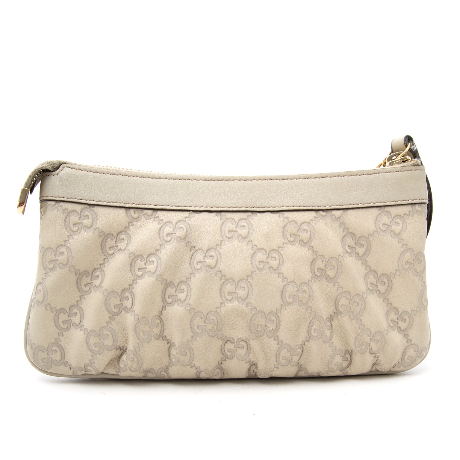 Crème Coloré Gucci Guccissima Clutch En Cuir en ligne pour le meilleur prix.