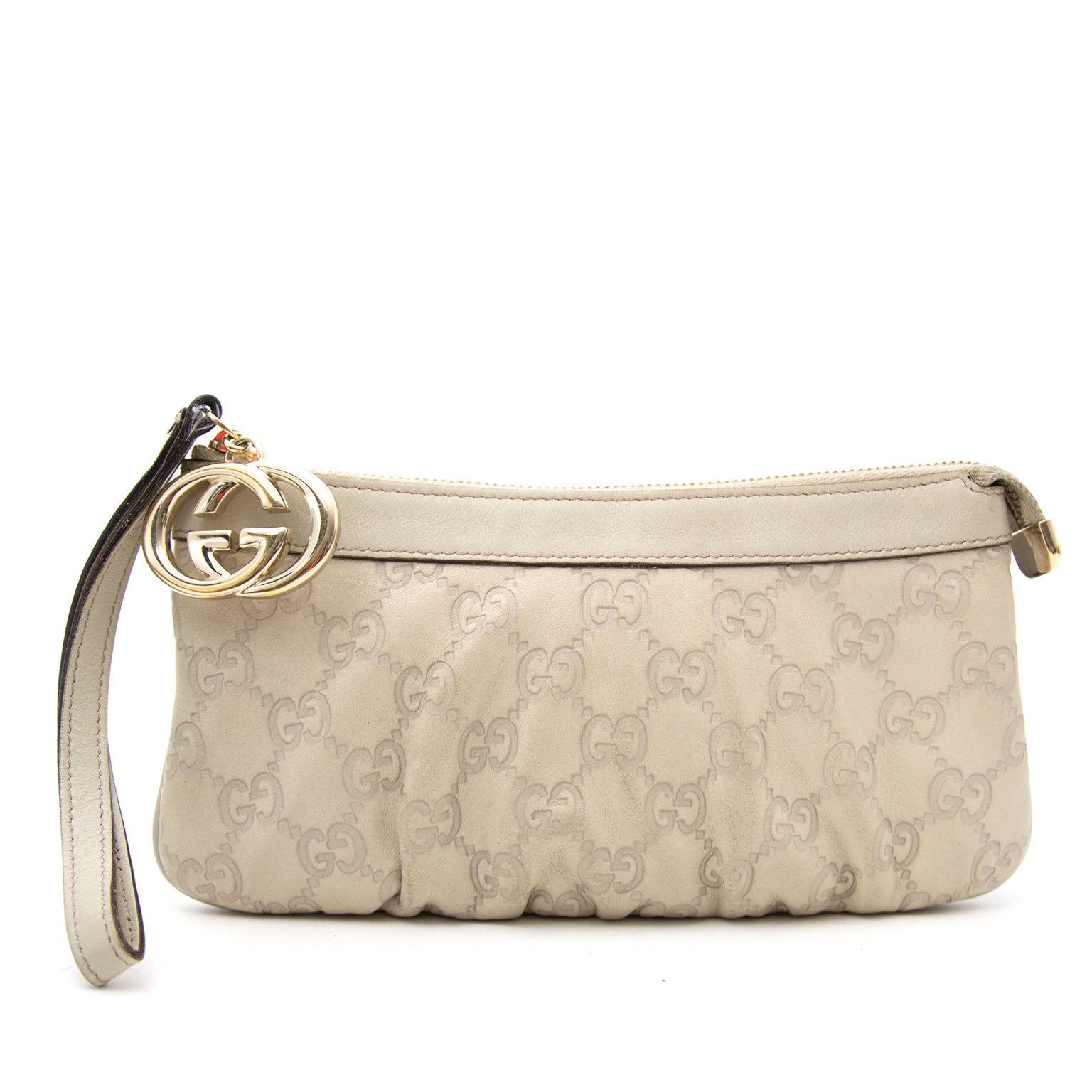 Gucci Crèmekleurige Lederen Guccissima Clutch nu online op labellov.com tegen de beste prijs.