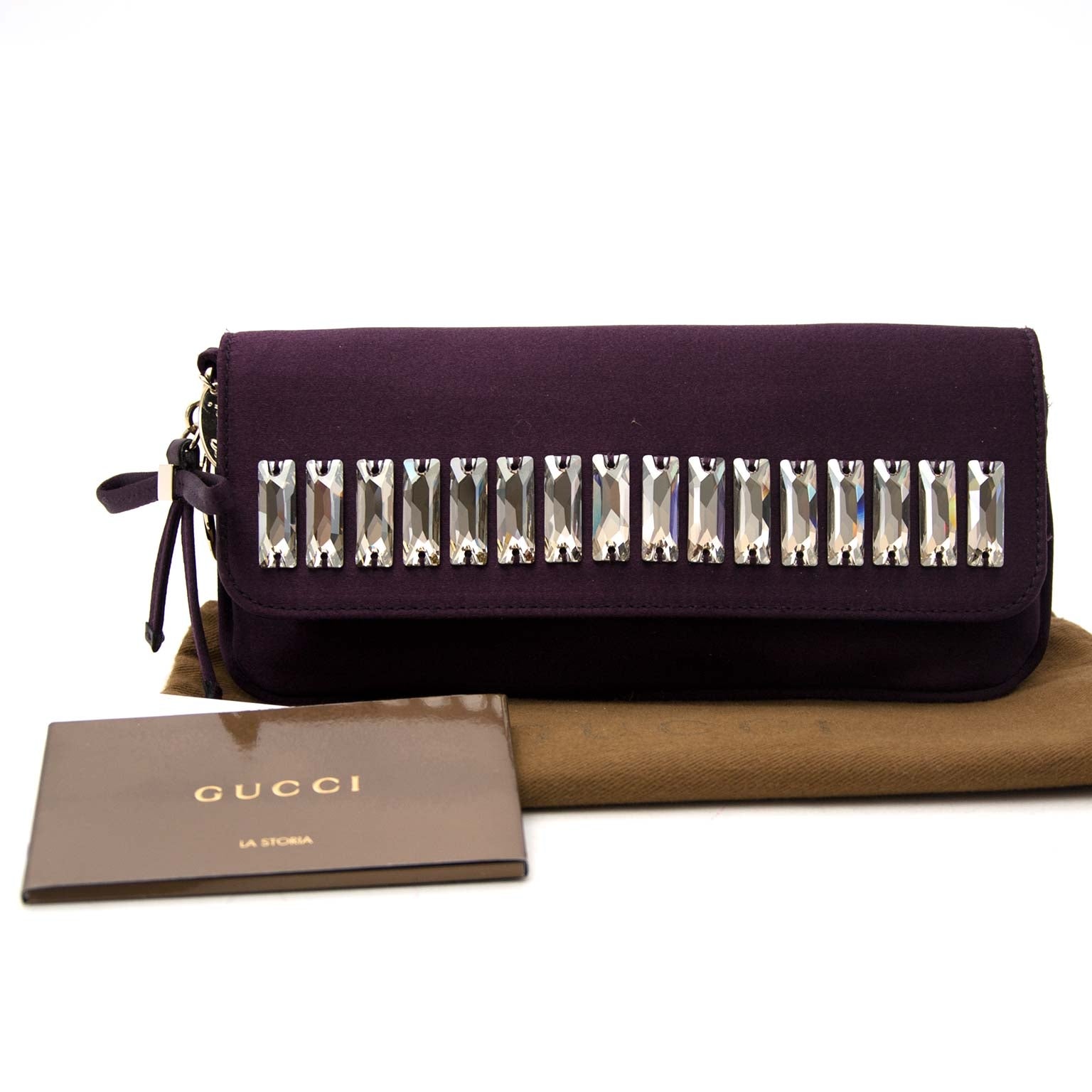 Gucci Crystals Purple Clutch Bag 'Buy authentic secondhand Gucci clutches at the right price at LabelLOV, safe and secure online shopping. Koop authentieke tweedehands Gucci avondtasjes aan de juiste prijs bij LabelLOV.'