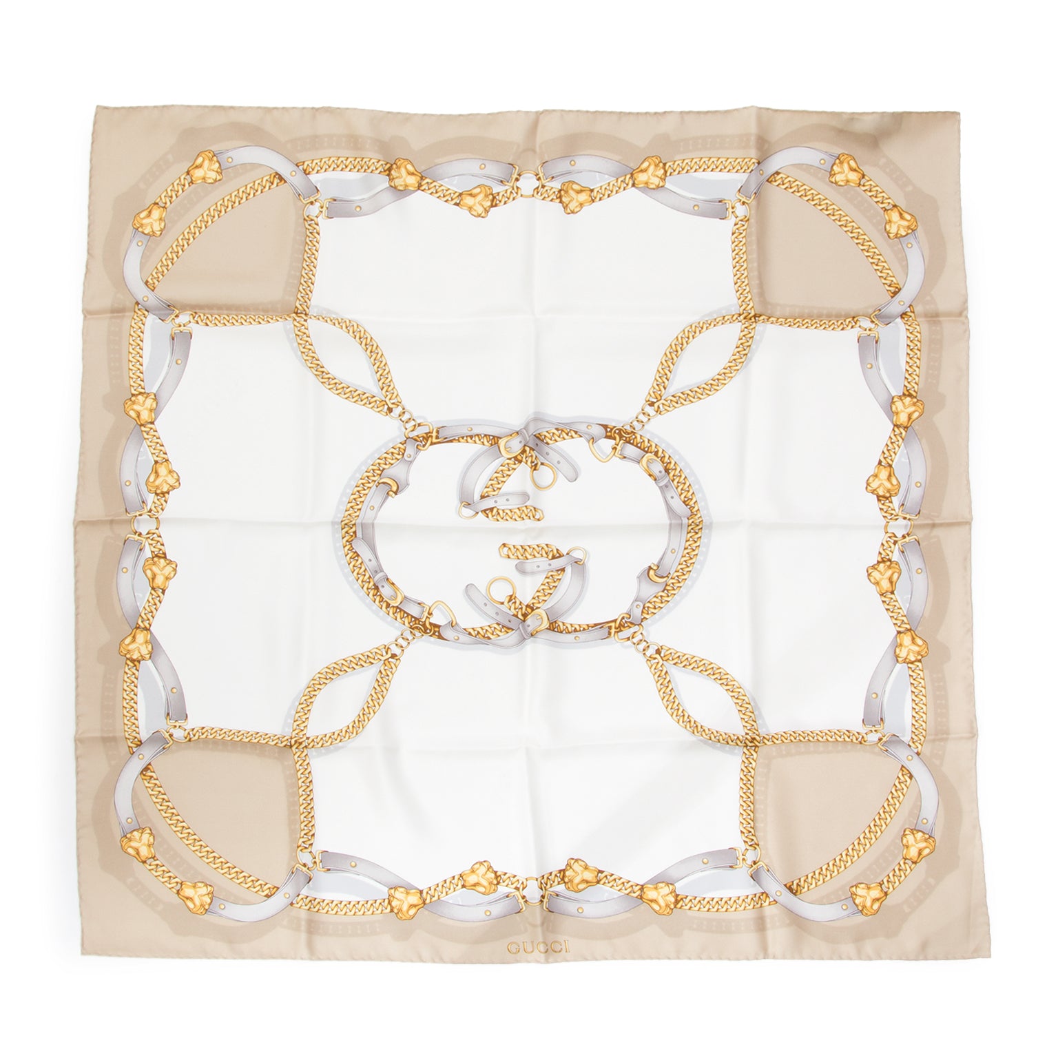A beautiful and authentic Gucci silk scarf in the classic chain link motif with medallions and straps. The pattern is printed in two tone muted golden yellow on pure muted soft white. A classy and elegant scarf for a luxurious look.