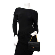 Buy and sell your designer bags and items such as this vintage Gucci Black Evening Bag