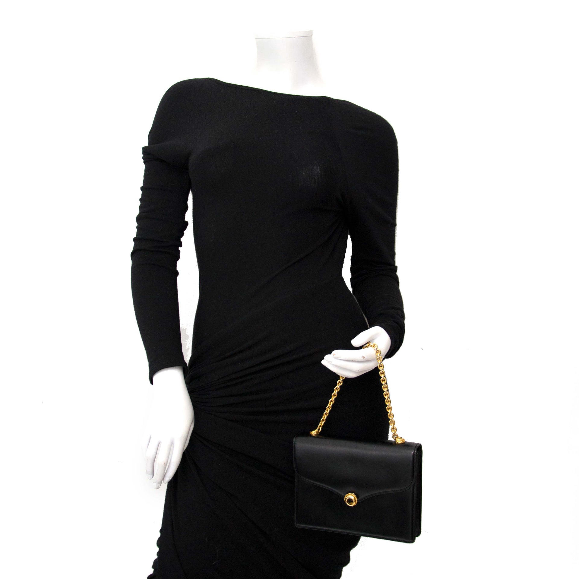 Buy and sell your designer bags and items such as this vintage Gucci Black Evening Bag