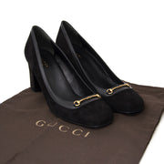 Buy Brand New Gucci black heels in suede with gold detail. at the right price at LabelLOV vintage webshop. Luxe, vintage, fashion. Safe and secure online shopping. Antwerp, Belgium.