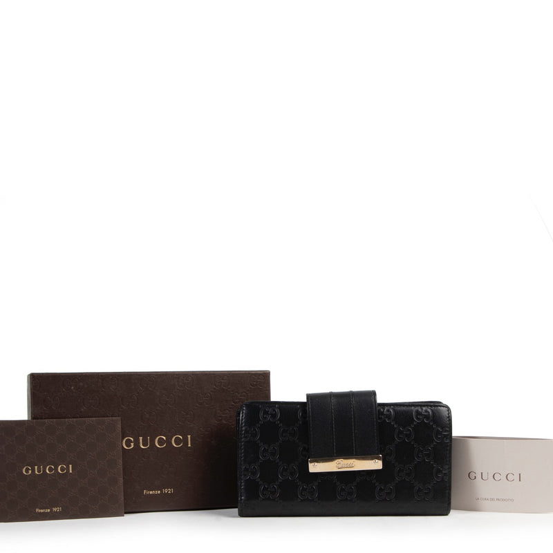 Koop authentieke tweedehands Gucci portemonnee in zwart met juiste prijs.