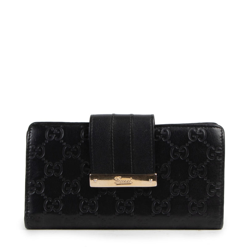 Achetez un authentique portefeuille Gucci en noir d'occasion au juste prix.