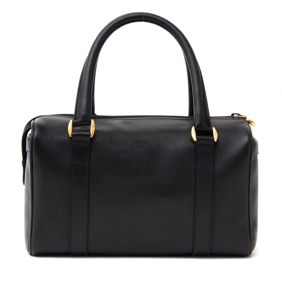 Buy Brand New Gucci dark blue boston bag with top handles. at the right price at LabelLOV vintage webshop. Luxe, vintage, fashion. Safe and secure online shopping. Antwerp, Belgium