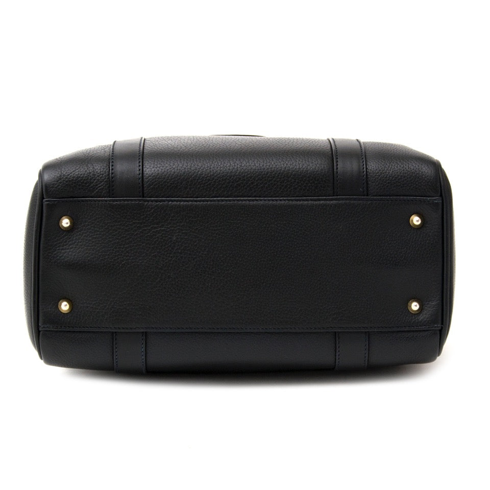 Buy Brand New Gucci dark blue boston bag with top handles. at the right price at LabelLOV vintage webshop. Luxe, vintage, fashion. Safe and secure online shopping. Antwerp, Belgium