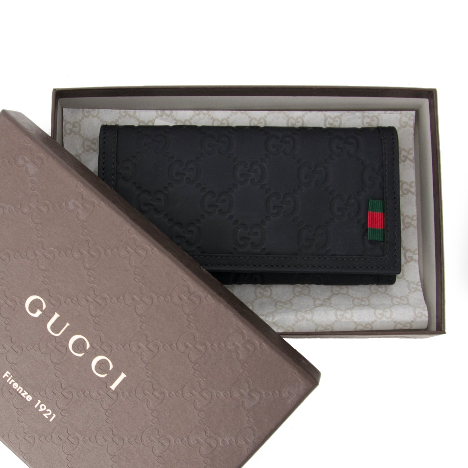 Authentieke Gucci Rubber Guccissima portefeuille voor de juiste prijs bij LabelLOV vintage webshop. Veilig online winkelen. Luxe, vintage, mode. Antwerpen, België.