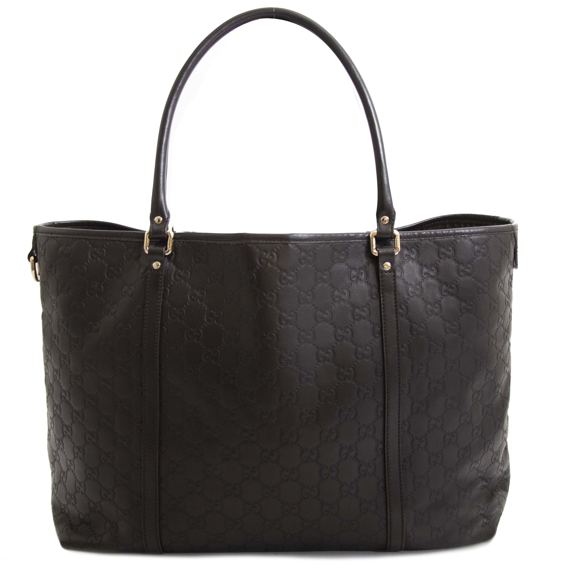 Gucci Brown Leather Guccissima Tote Bag at Labellov. Safe online shopping at a fair price.