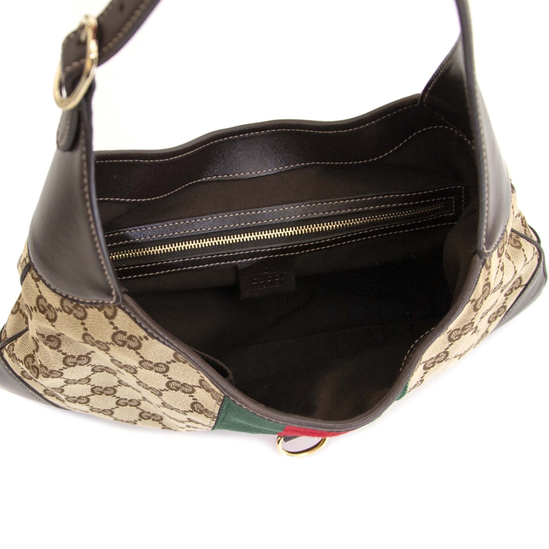 Gucci Brown Monogram Jackie Bag for sale online at Labellov