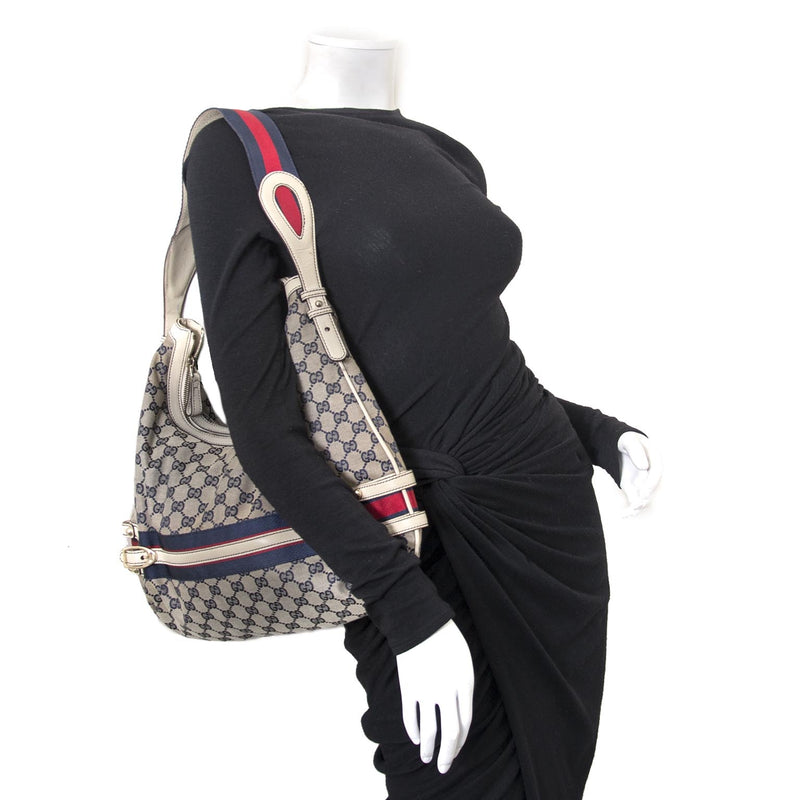 acheter en ligne chez labellov.com pour le meilleur prix Gucci bleu Monogram Canvas sac a epole
