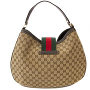 Gucci Beige/Ebony GG Canvas New Web Hobo Bag. Koop online tweedehands Gucci tas met de iconische GG print Guccio Gucci. Dustbag. Webshop met veilige betaling.