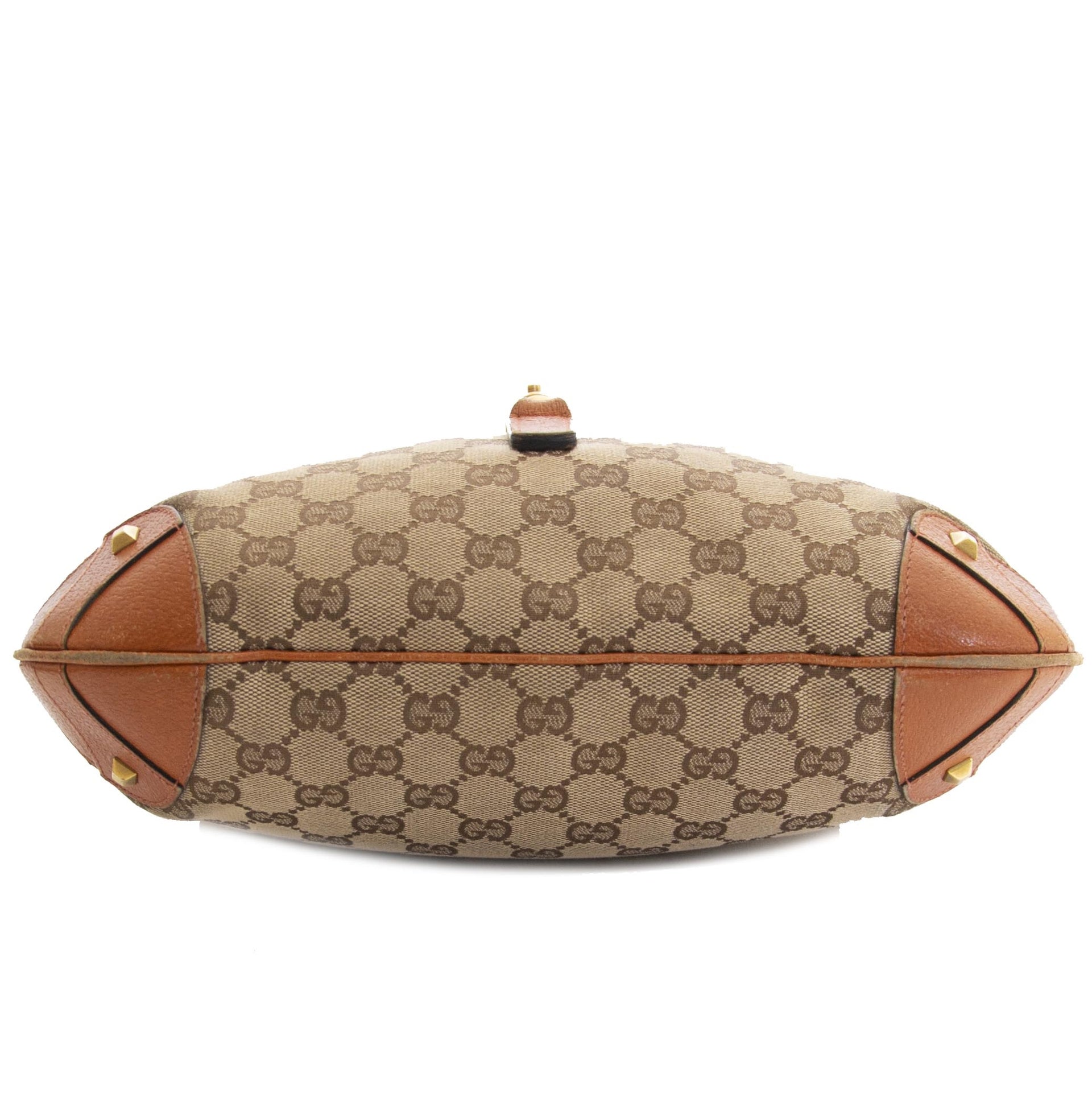 For sale online at Labellov: Gucci Monogram and Orange Jackie Bag te koop