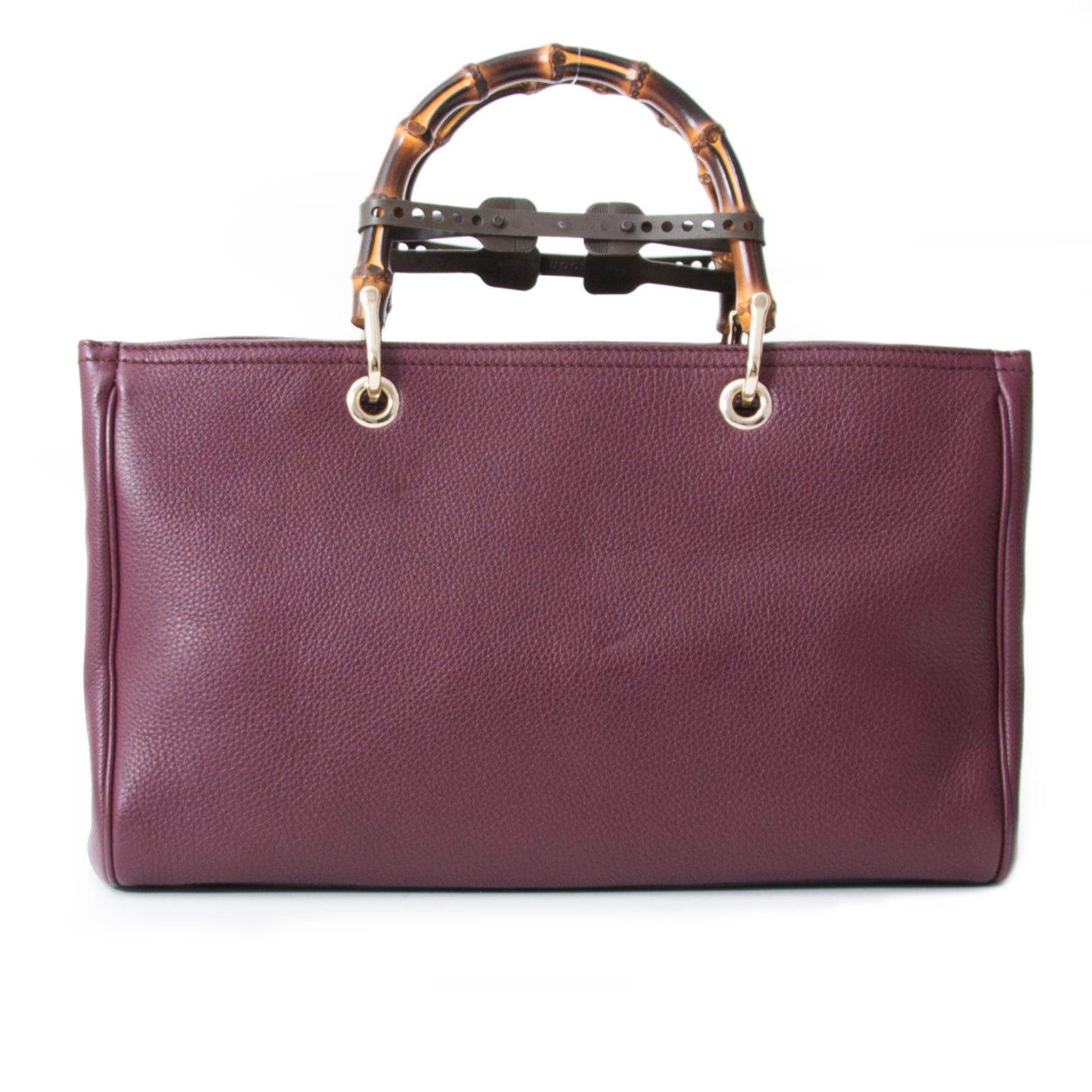 Buy authentic Gucci Burgundy Bamboo Tote at the right price at LabelLOV vintage webshop. Luxe, vintage, fashion. Safe and secure online shopping. Antwerp, Belgium.