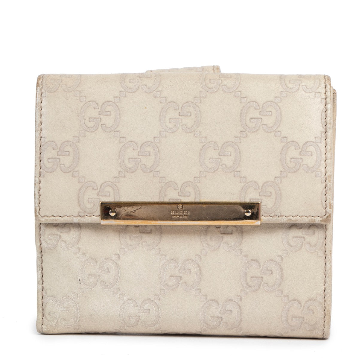 Acheter en ligne portefeuille de Gucci en beige.