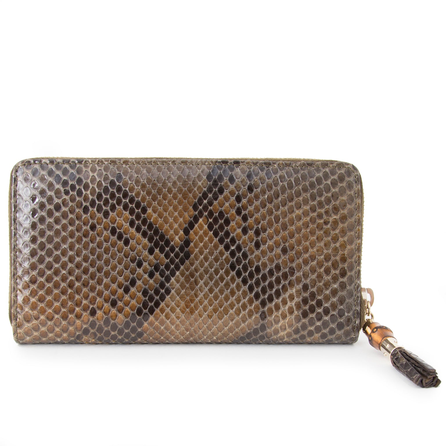 Authentieke Gucci portefeuille python voor de juiste prijs bij LabelLOV vintage webshop. Veilig online winkelen. Luxe, vintage, mode. Antwerpen, België.