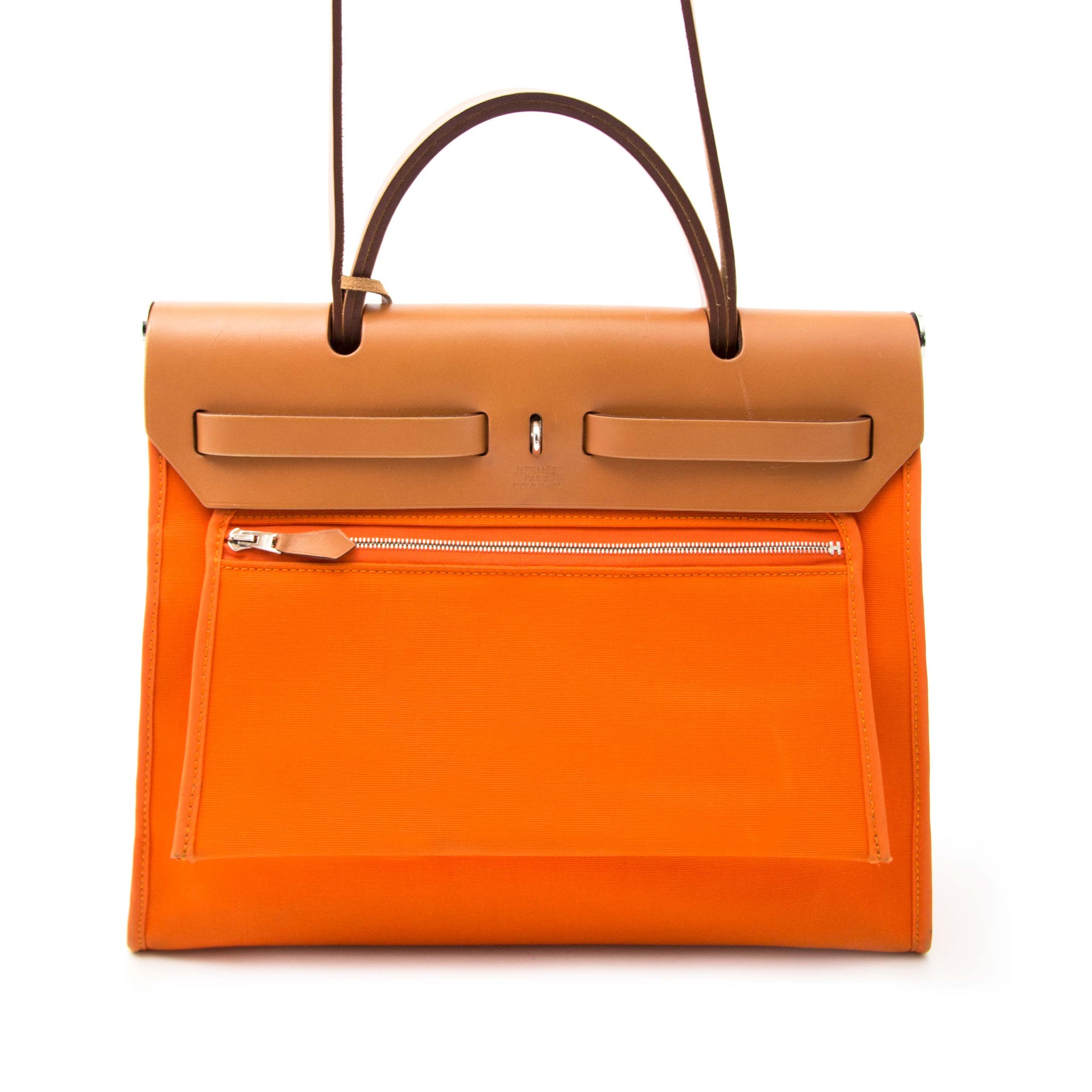 Are you looking for an exclusive Hermès Herbag Zip 31 cm in orange toile officier and vache hunter ?