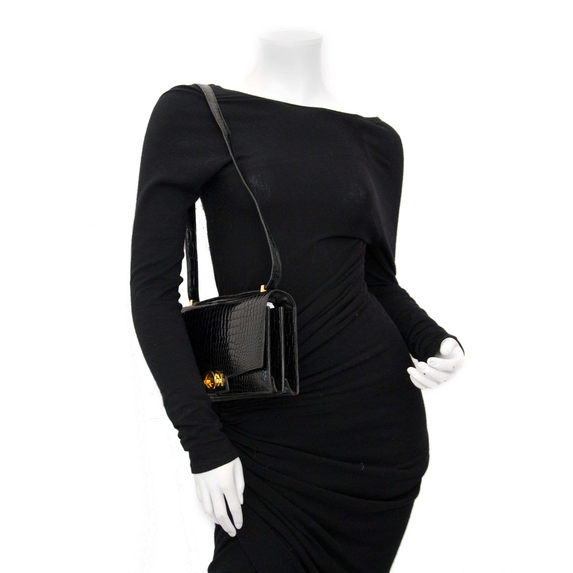 searching for a luxury collectors item Vintage Hermes Black Croco 'Sac Ring' Shoulder Bag