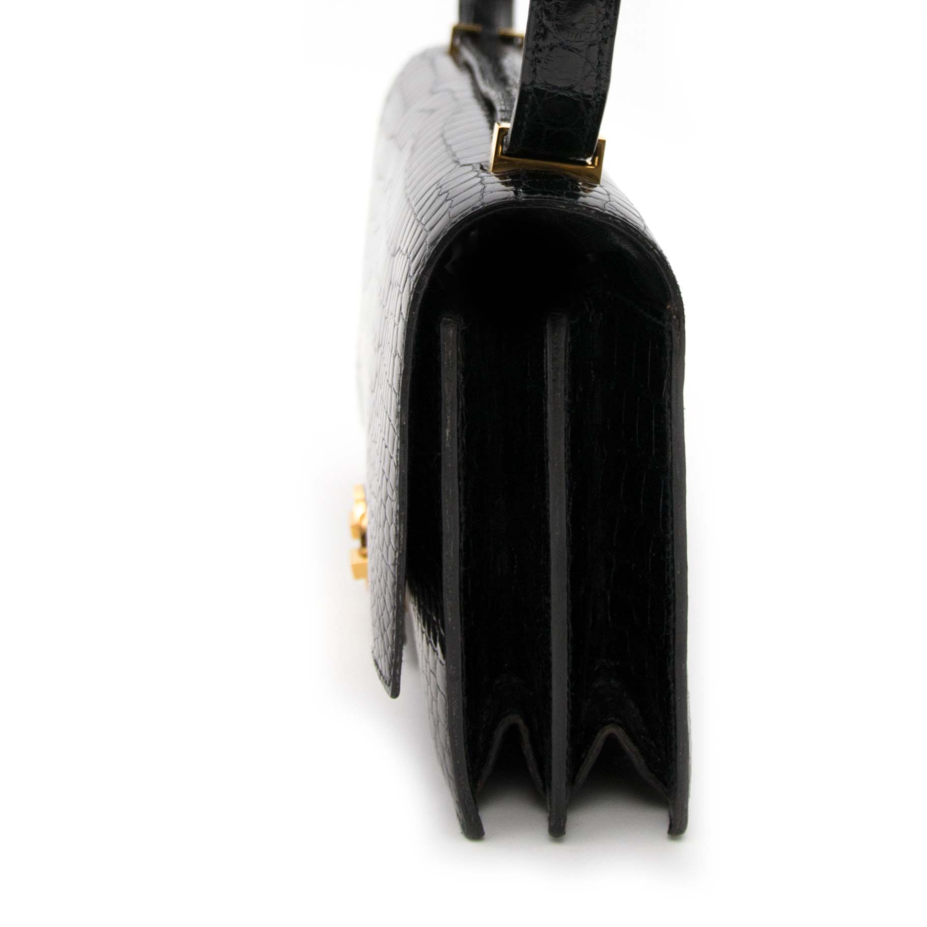 searching for a luxury collectors item Vintage Hermes Black Croco 'Sac Ring' Shoulder Bag