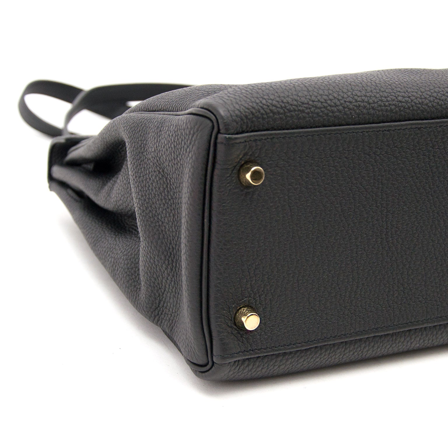 Labellov secondhand vintage and brand new bags such as Hermès Kelly Retourne 32 Veau Togo Noir GHW for sale online