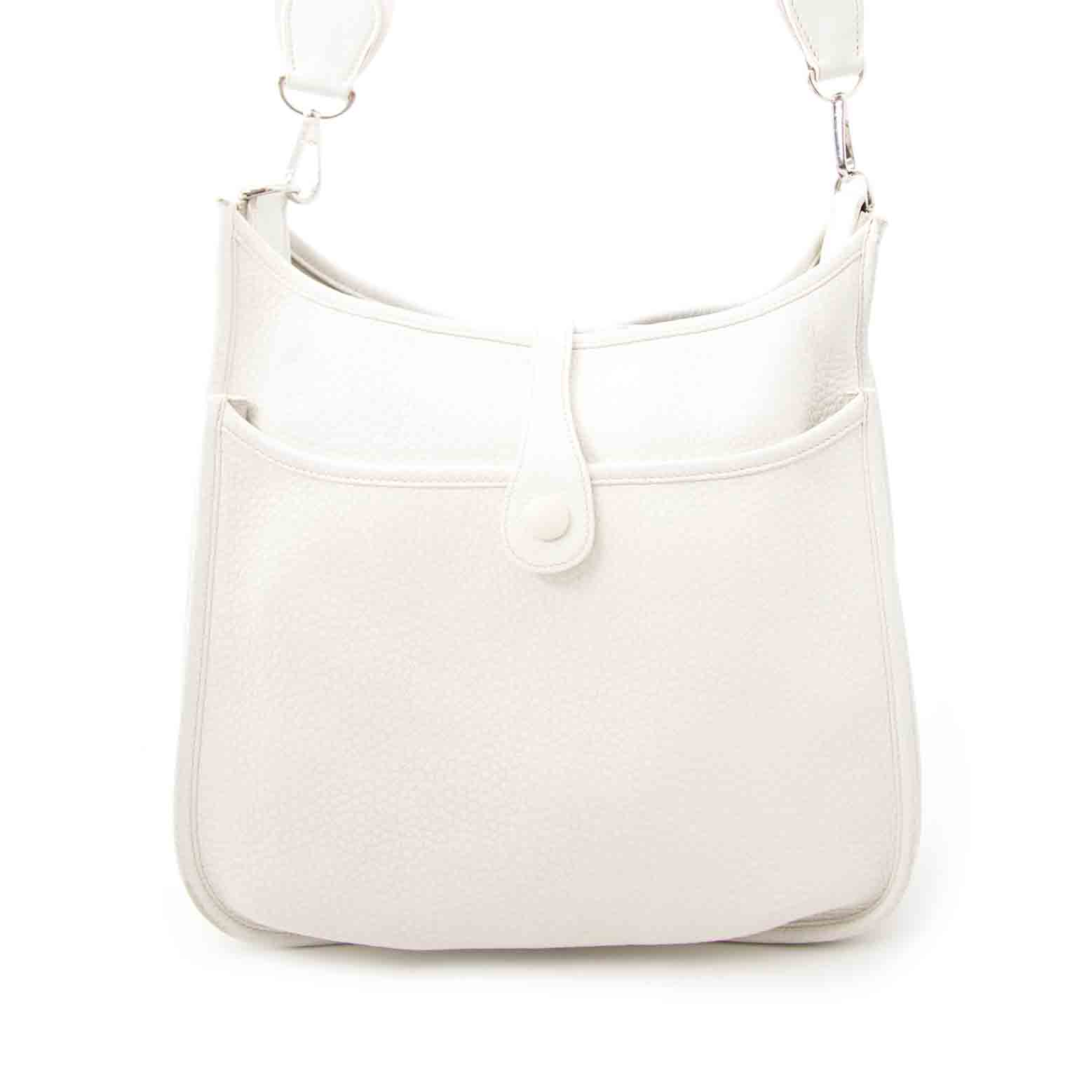 Shop safe and secure Hermès White Evelyne Messenger Bag at Labellov.com