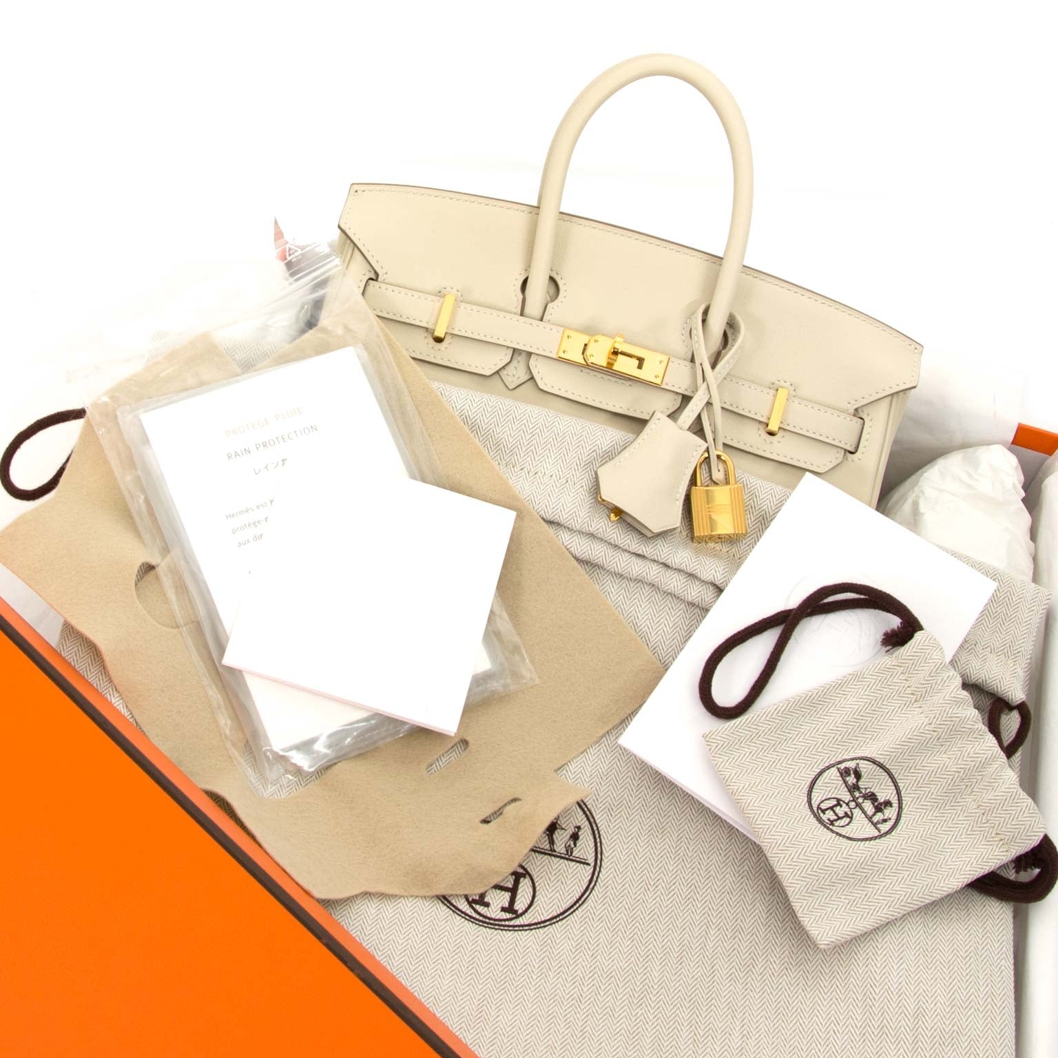 Buy and sell your authentic designer handbags at Labellov Hermès Birkin 25 Veau Swift Craie GHW