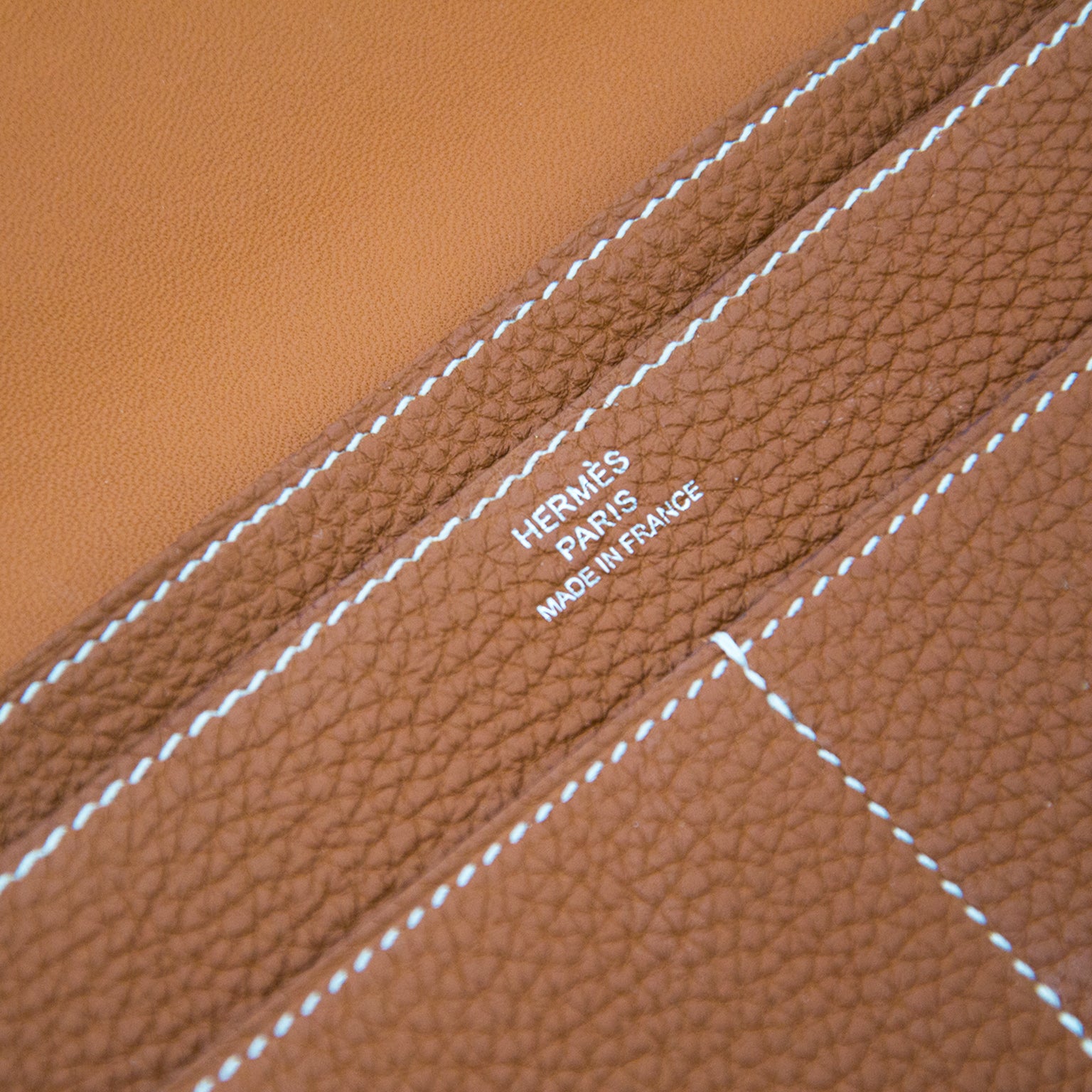 Shop Hermès Dogon Wallet Gold PHW safe and secure at labellov.com
