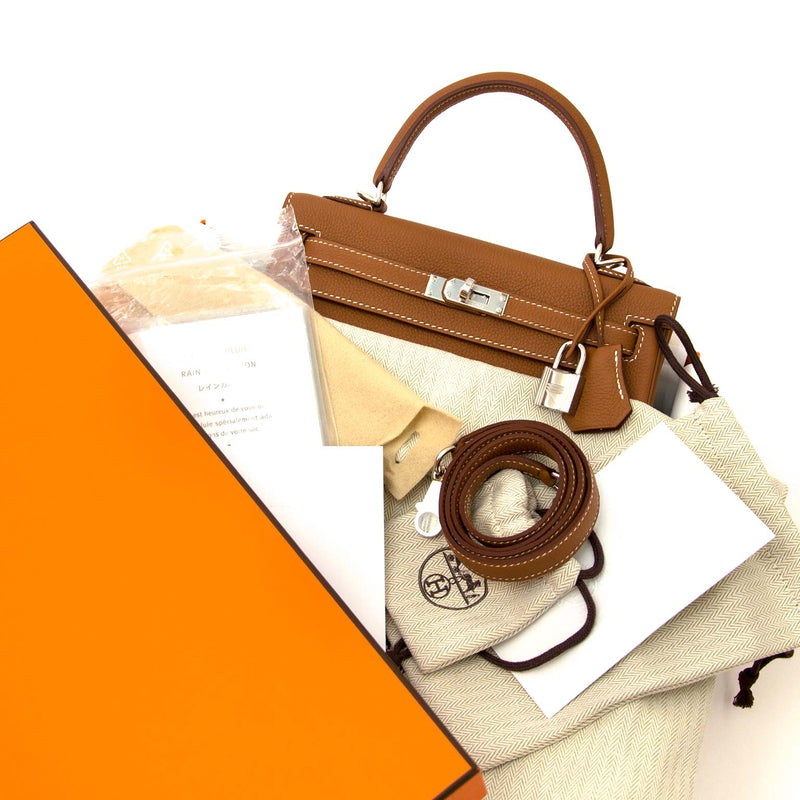 Hermès Kelly 25 Gold Togo PHW now online at labellov.com 100% authentic designer bags