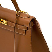 acheter en ligne chez labellov.com Hermès Kelly 28cm gold cuir courchevel GHW