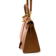 acheter en ligne Hermès Kelly 28cm gold cuir courchevel GHW chez labellov.com sans liste d'attends