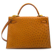 Hermès Kelly 32 Ostrich Gold GHW for sale at Labellov preloved and secondhand designer bags online