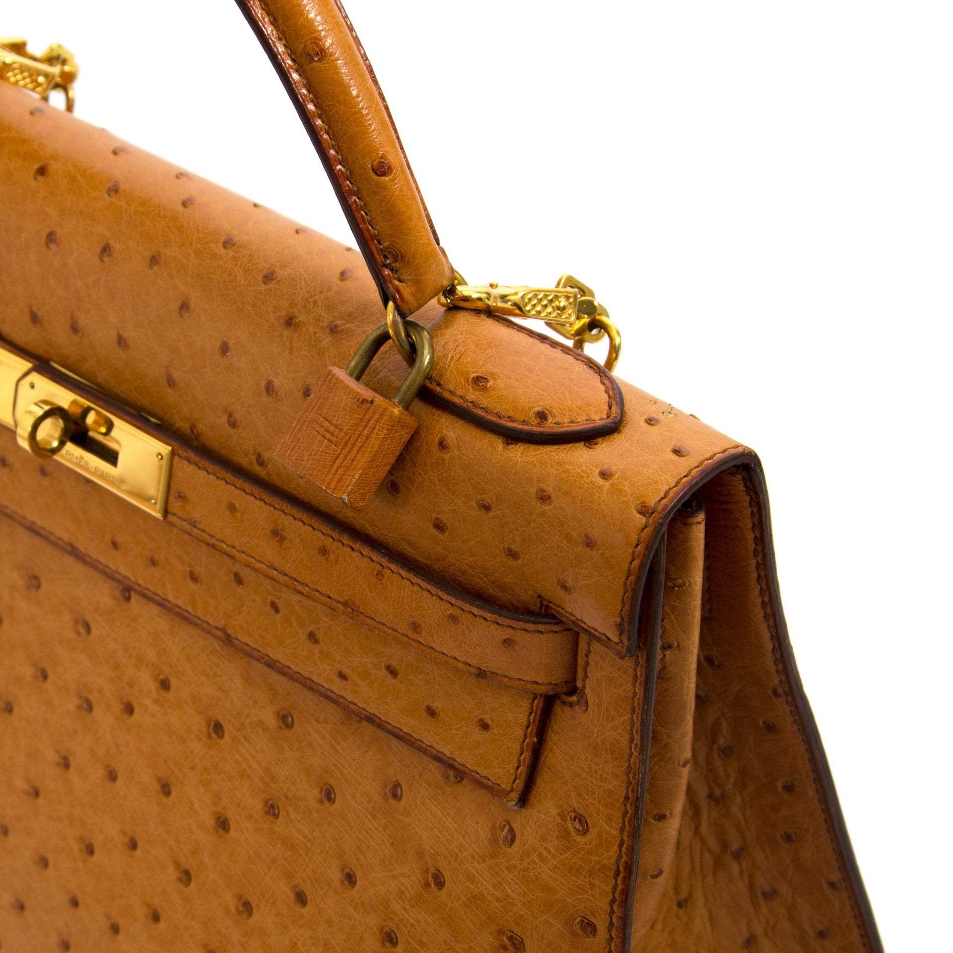 Verkoop uw Hermès Kelly 32 Struisvogel Leder Gold GHW vandaag nog