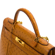 Hermès Kelly 32 Ostrich Gold GHW te koop bij Labellov in Antwerpen