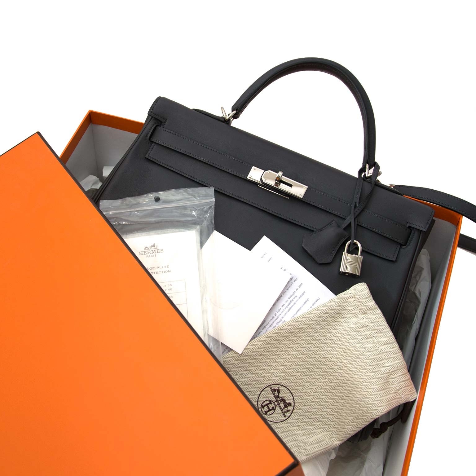 koop online jou tweedehands authentic Hermes Kelly 35 Retourne Ardoise Swift PHW online at the best price