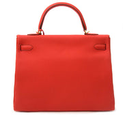 koop veilig online op labellov.com Hermès Kelly 35 Togo Capucine GHW nooit gedragen in perfecte staat
