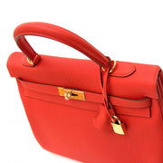 Hermès Kelly 35 Togo Capucine GHW for sale at labellov.com, skip the waitinglist