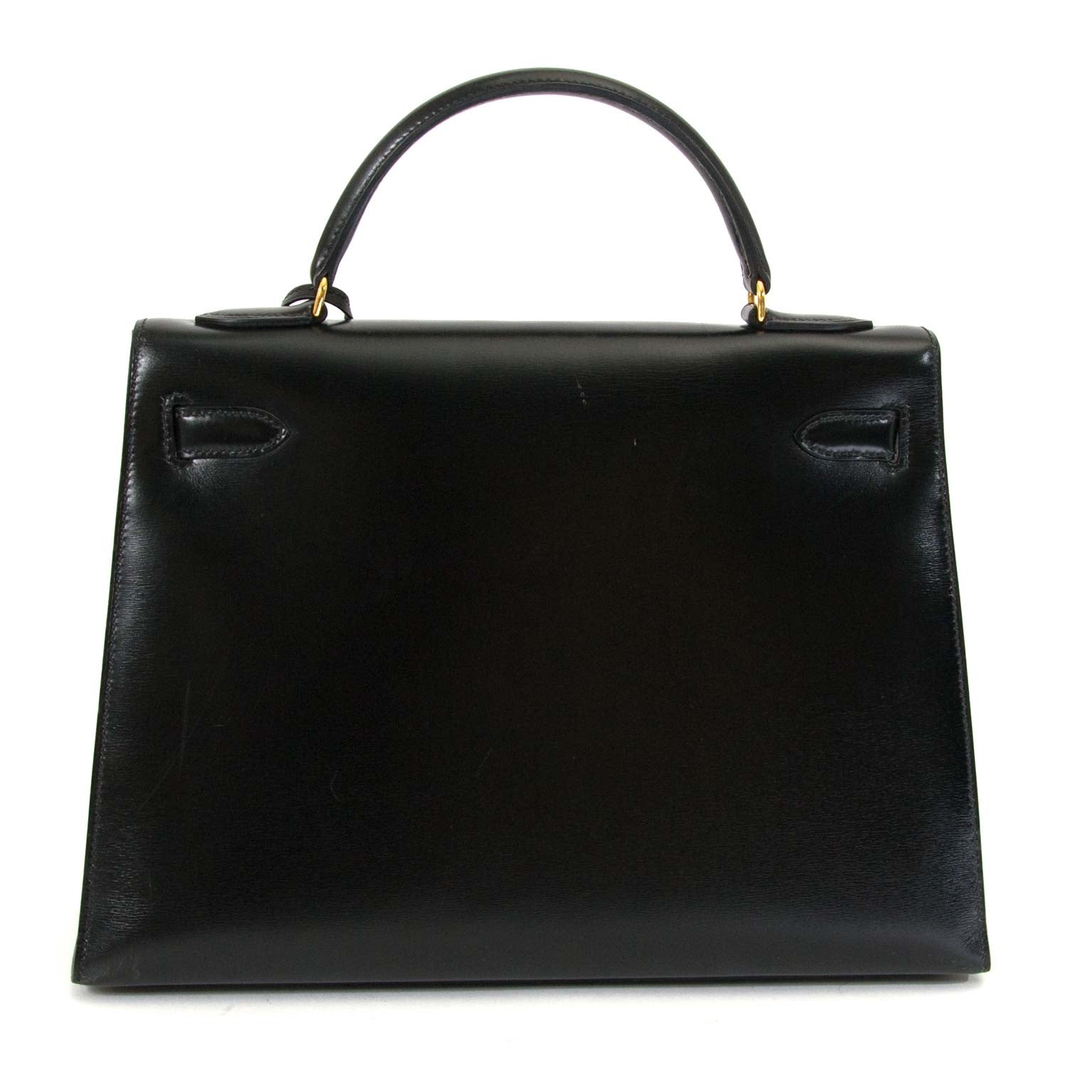 Are you interested in an authentic Hermès Kelly 32 Black Box Calf GHW? Buy safely at Labellov.