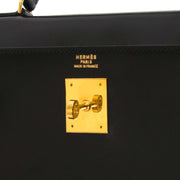 Hermès Kelly 32 Black Box Calf GHW pour le meilleur prix chez Labellov à Anvers.