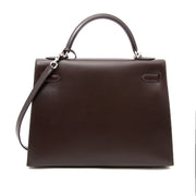 Koop een tweedehands Hermes Kelly Chocolate 32 + Strap bij Labellov.