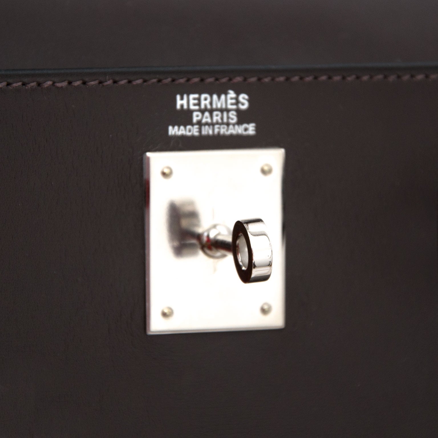 Buy an authentic Hermes Kelly Chocolate 32 + Strap at the right price