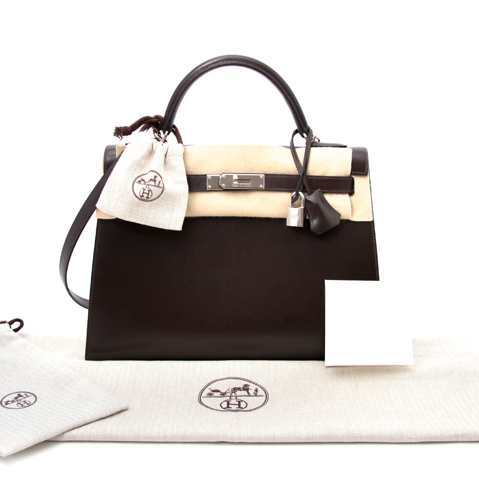 Buy a secondhand Hermes Kelly Chocolate 32 + Strap at the right price