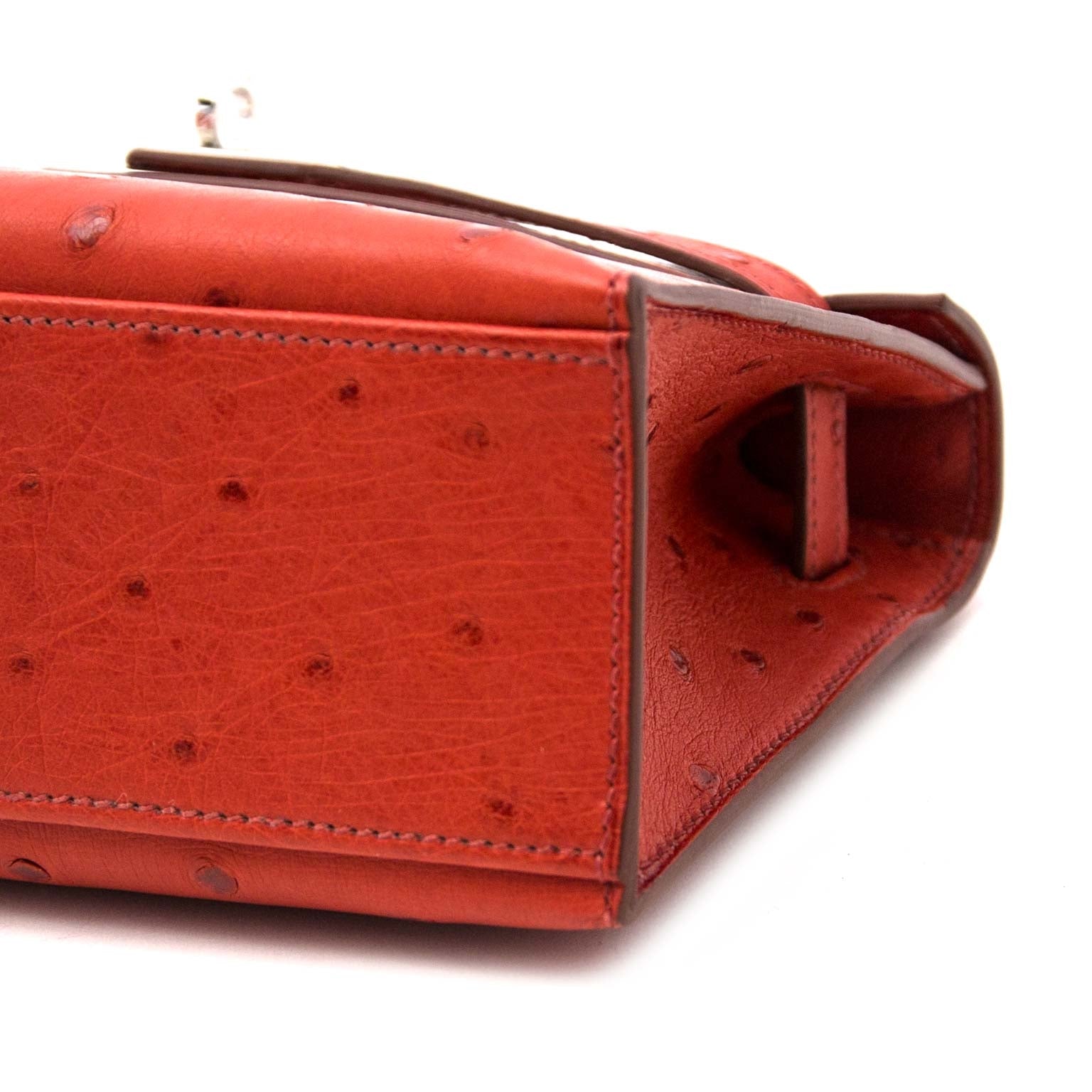 Hermès Kelly Mini Pochette Autruche Brique PHW