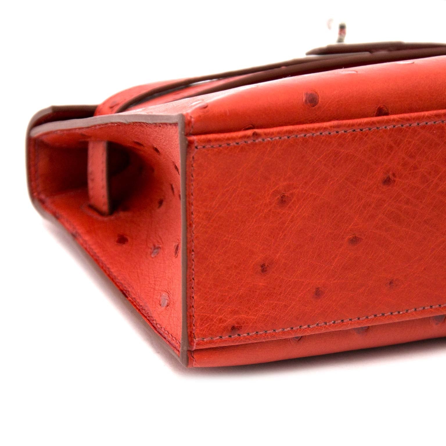 Hermès Kelly Mini Pochette Autruche Brique PHW