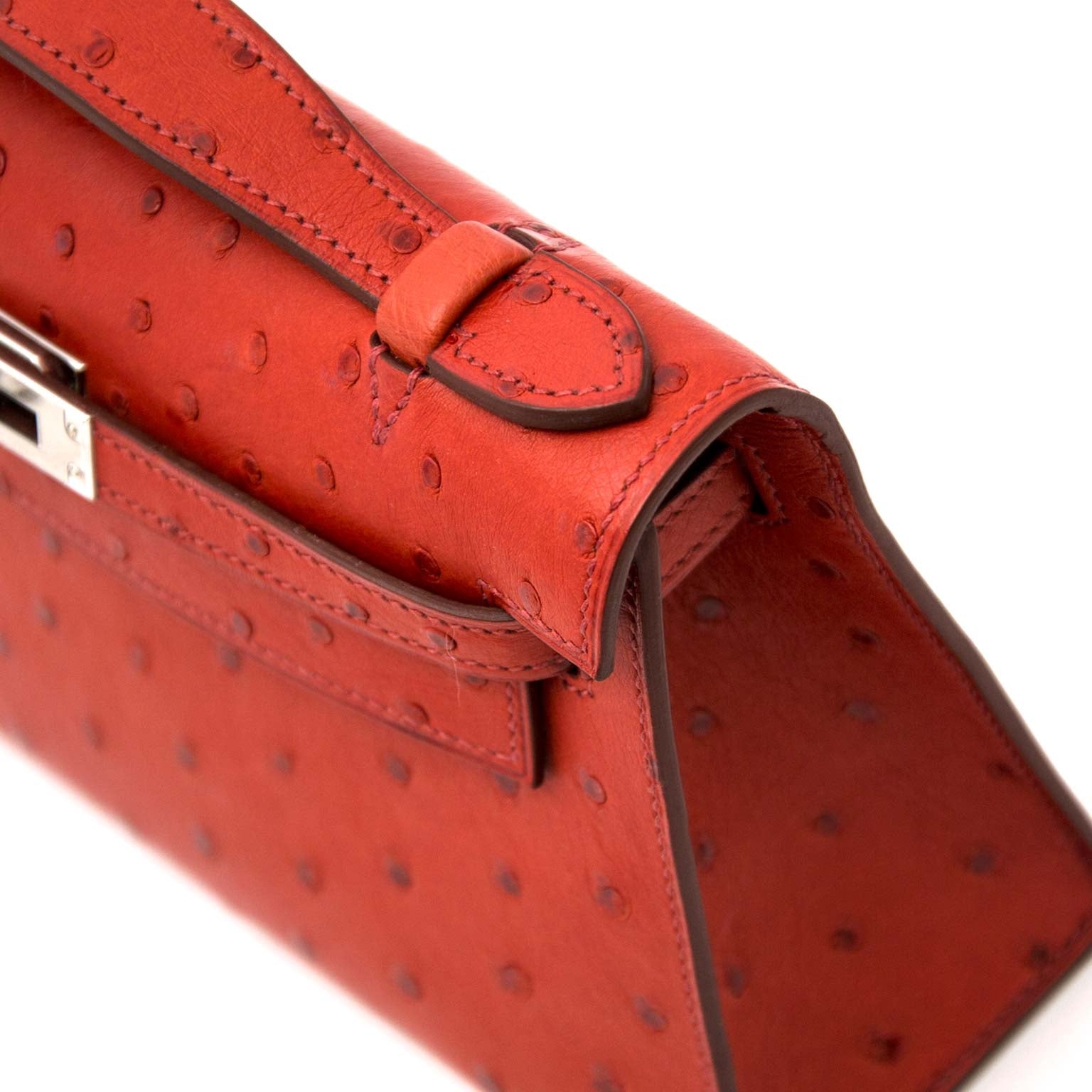Hermès Kelly Mini Pochette Autruche Brique PHW