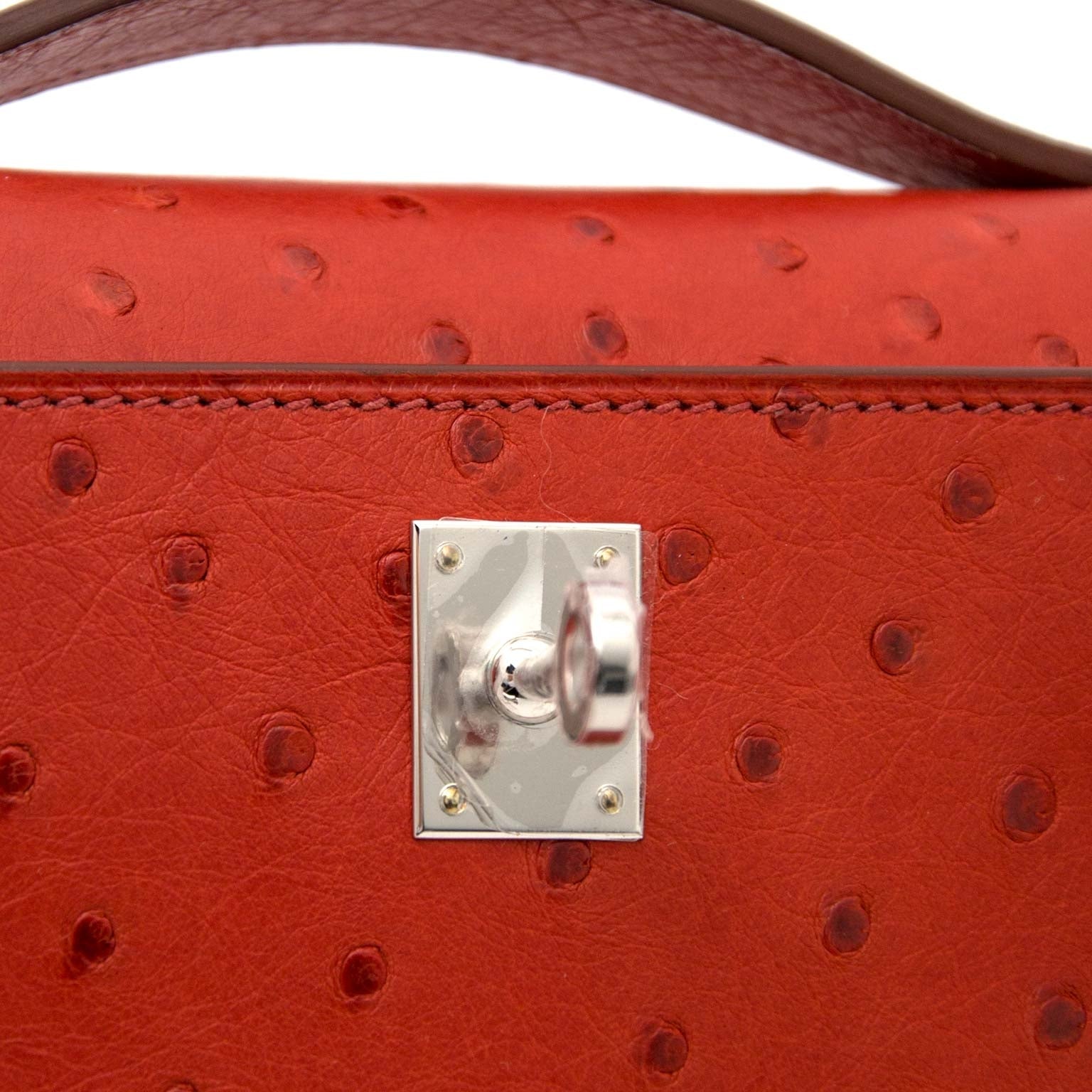 Hermès Kelly pochette ostrich brique GHW nu te koop zonder wachtlijst bij labellov.com