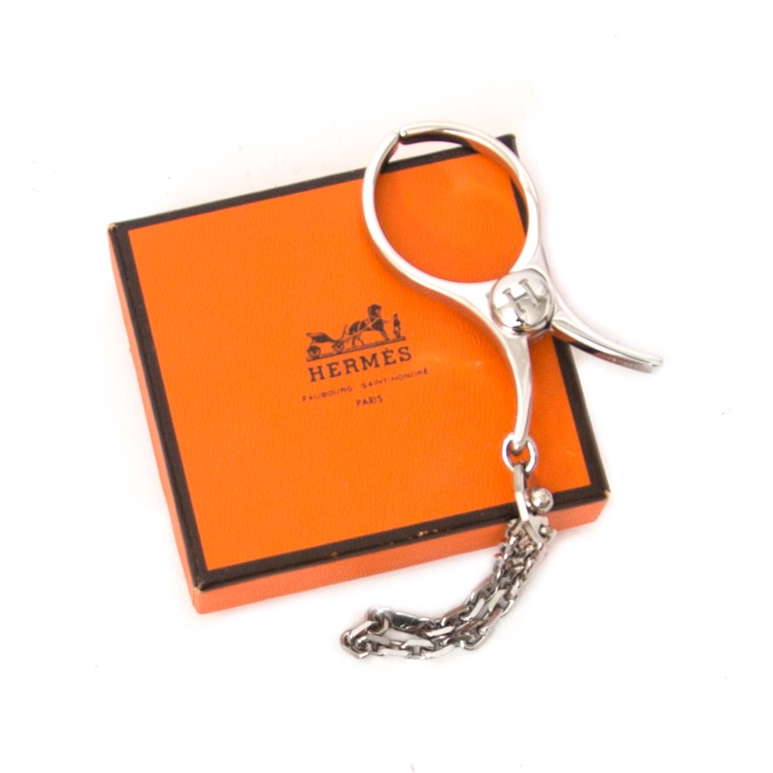 Porte-clés Hermès en forme de gant Filou, logo H, en argent