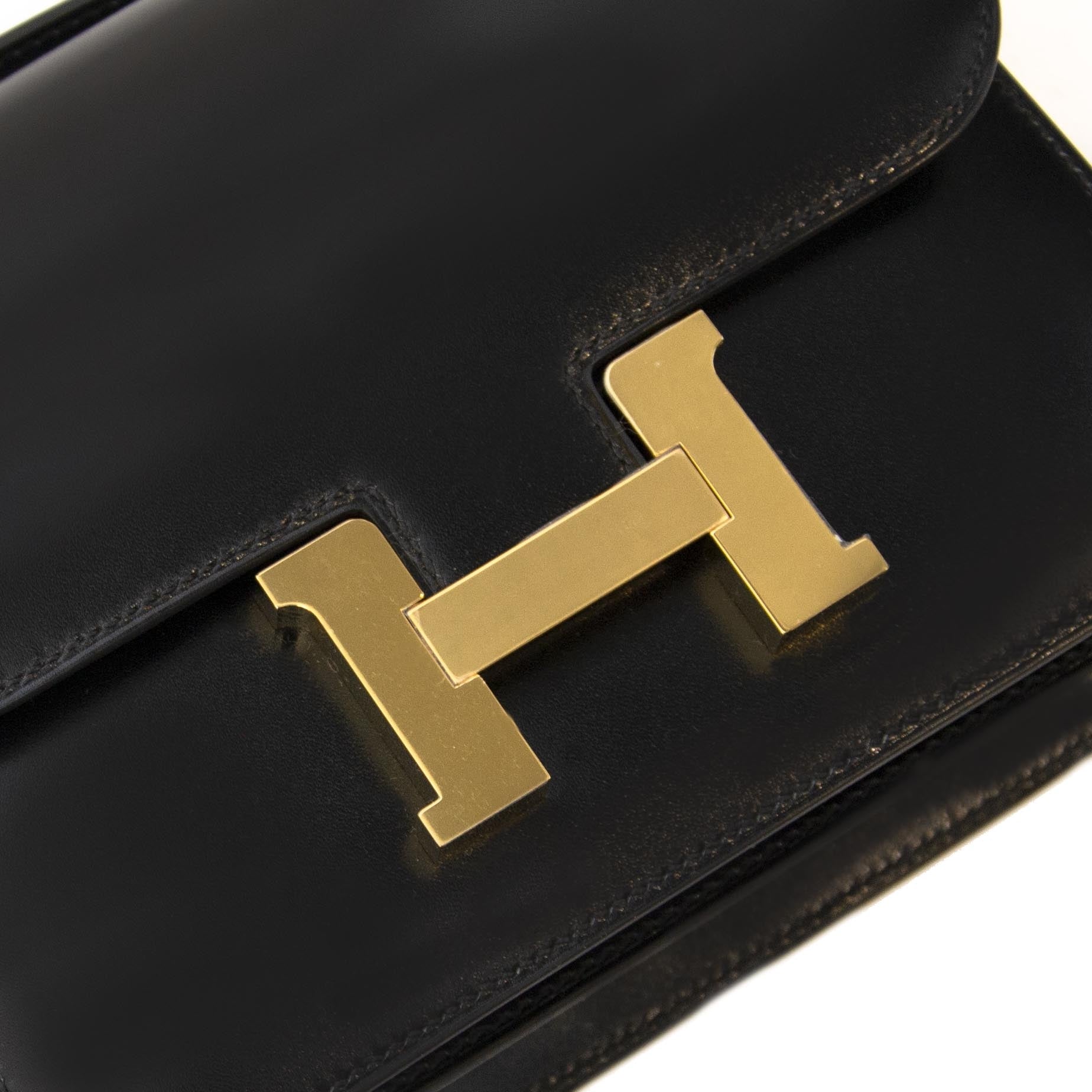 Buy and sell your 100% authentic Hermès Constance III Mini Veau Box Black for the best price