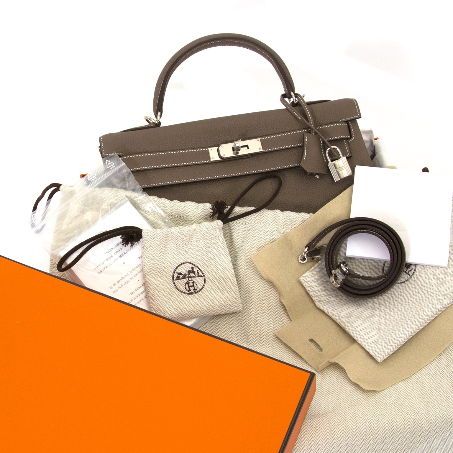 looking for a Hermès Kelly 32 Togo Etoupe PHW? Buy it now at labellov.com